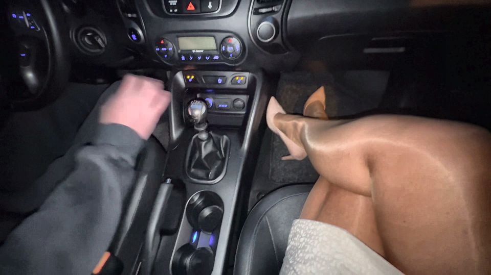 A sexy, elegant wife challenges the taxi driver to touch her legs, clad in pantyhose and high heels.